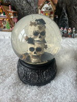 Skull snow globe