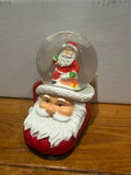 Santa boot snow globe