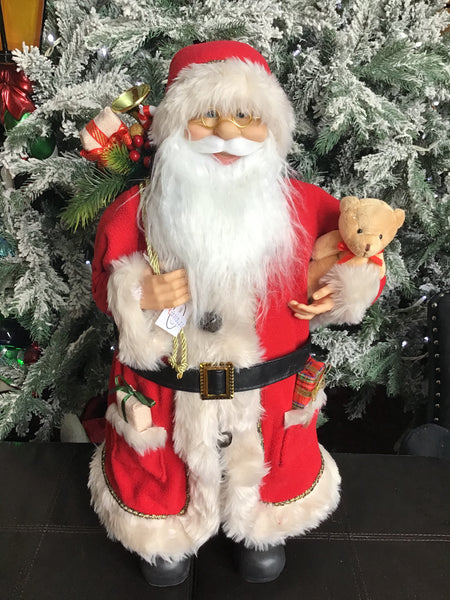 Santa Carrying Teddy and Toy Sack