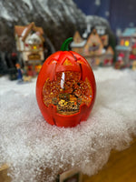 Pumpkin moving snow globe