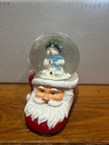 Santa boot snow globe