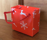 Assorted Mini Sitting Santas in Bags