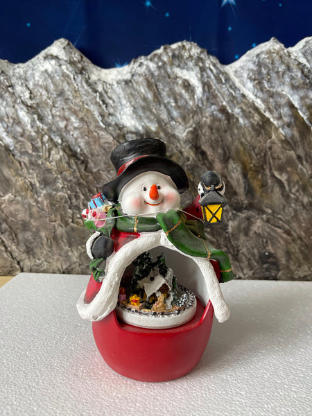 Snowman with rotating train LED