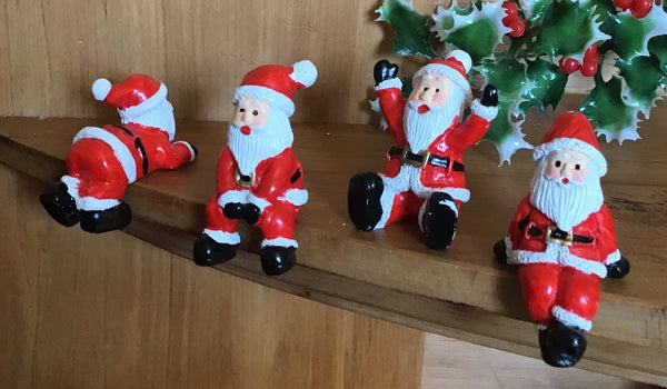 Assorted Mini Sitting Santas in Bags
